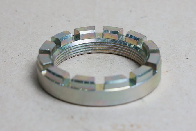 Гайка полумуфты ротора нагнетателя